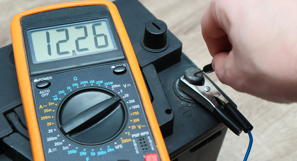 Check and charge car battery with charger